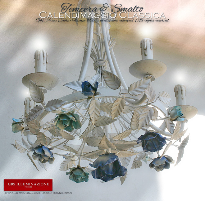 White wrought iron chandelier, the cobalt and turquoise Calendimaggio Classica is entirely hand-painted.