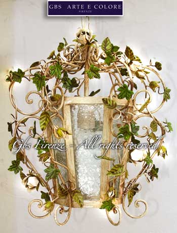 white lantern with painted roses